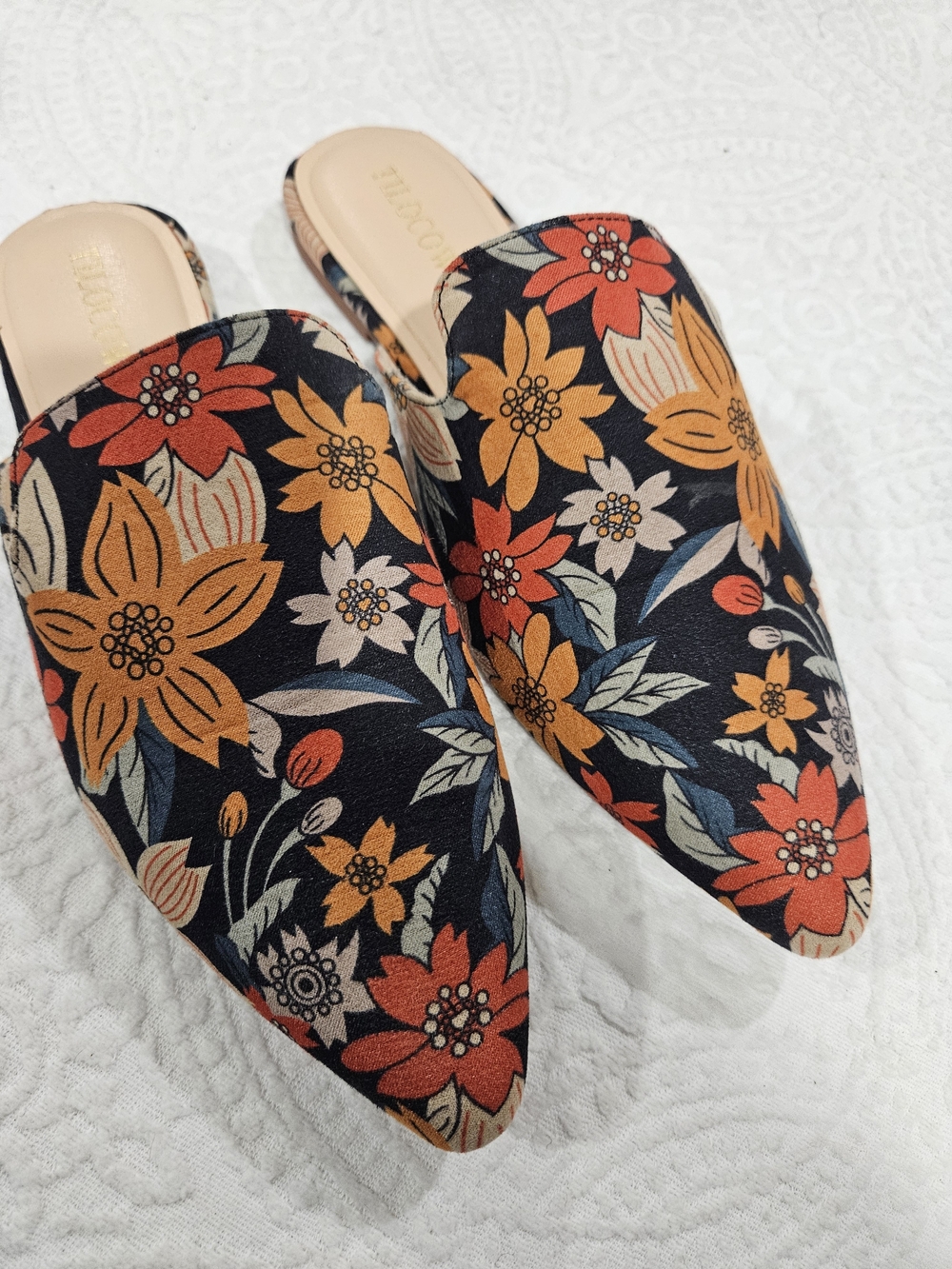 Pointed Floral Slip-On Mules in Black with Orange & Red Blooms